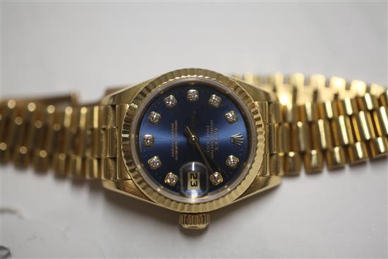 A ladys 18ct gold and diamond set Rolex Oyster Perpetual Datejust and box,